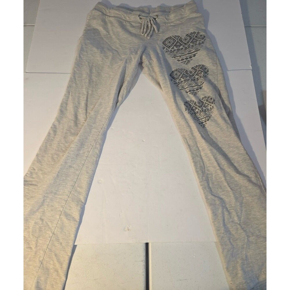 Tarea by Rue 21 pants Women’s size Medium Gray With 3 Tribal Hearts